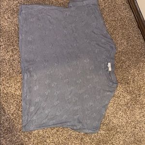 A grey knitted cropped sweater